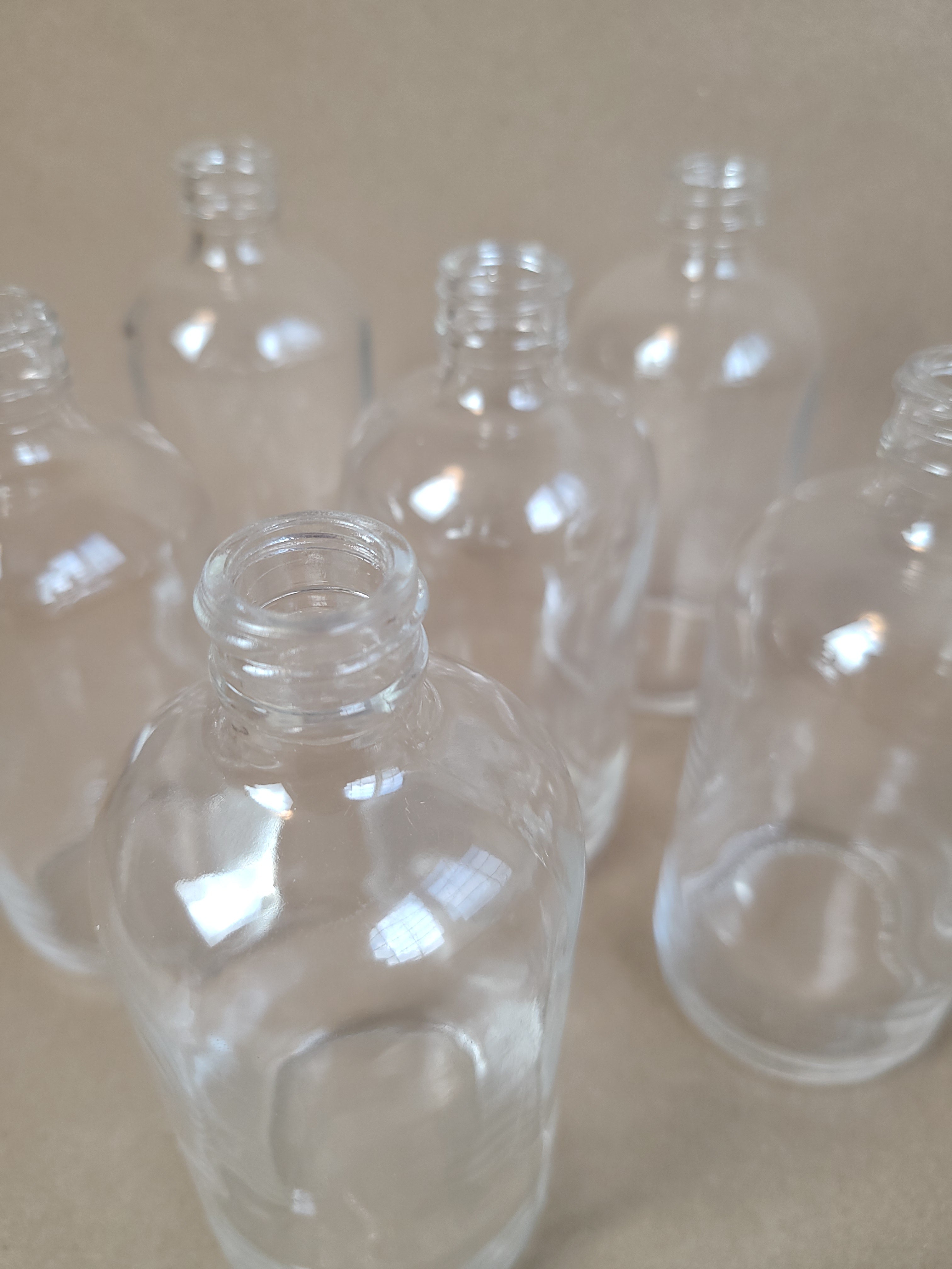 SMALL CLEAR GLASS BOTTLE VASE