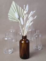 Load image into Gallery viewer, SMALL AMBER GLASS BOTTLE VASE
