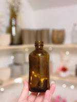 Load image into Gallery viewer, SMALL AMBER GLASS BOTTLE VASE

