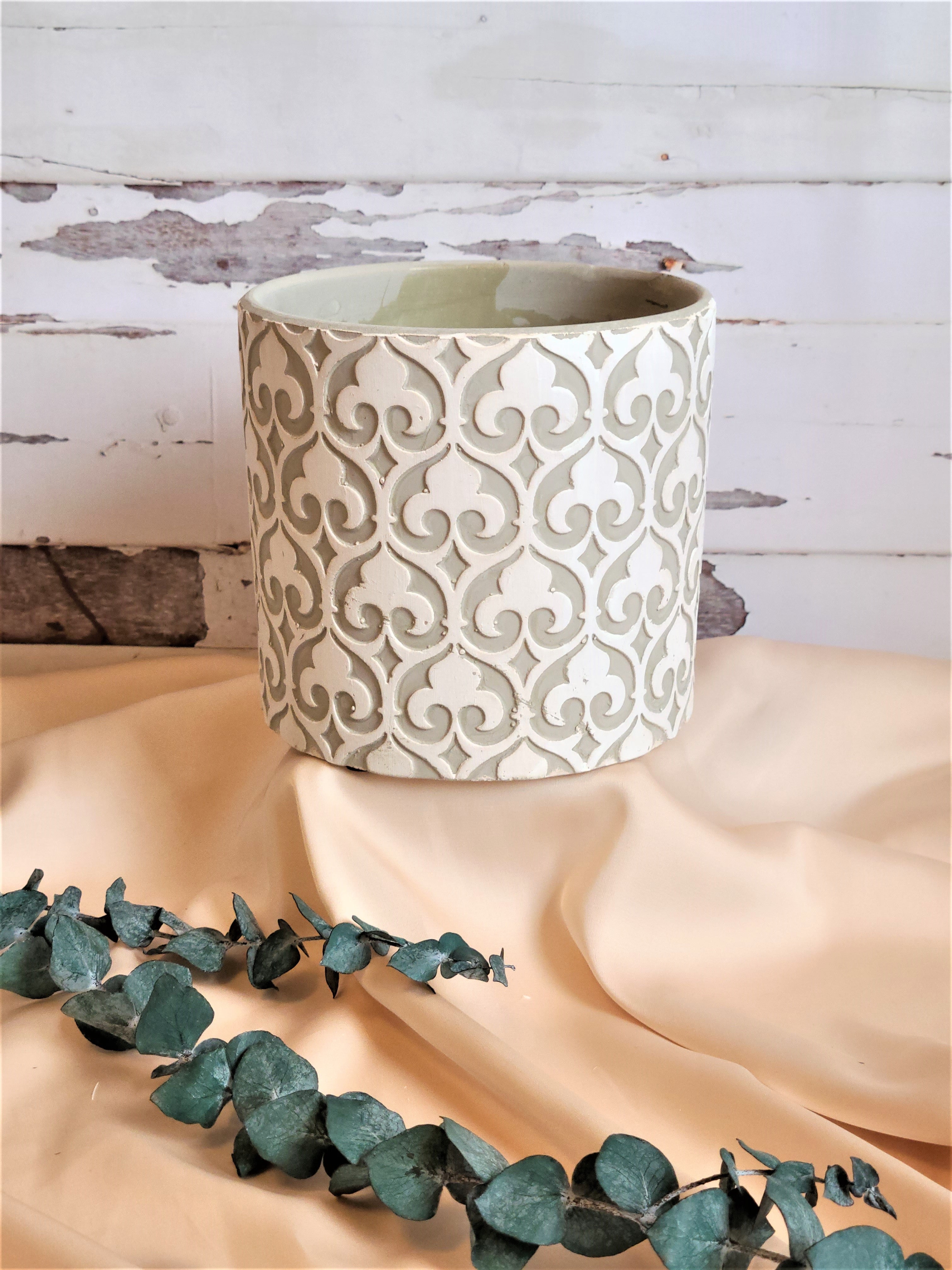 CEMENT FLOWER PLANTER WITH DECORATIVE DESIGN